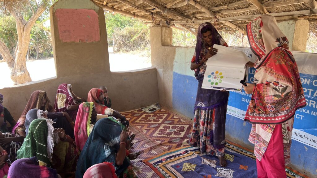 Moomal speaks to a group of young girls on sexual and reproductive health and rights.