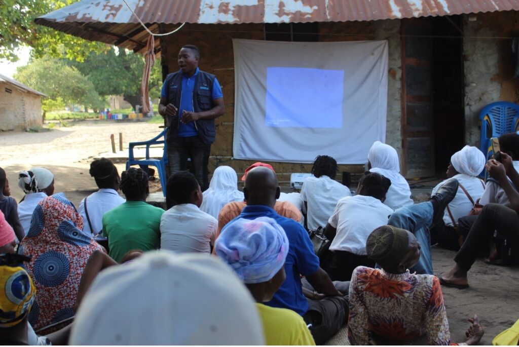 Jose Mpingo, Field Supervisor with Preventing Child Marriage in Cabo Delgado program, shares a short video. Photo: Pathfinder Mozambique 