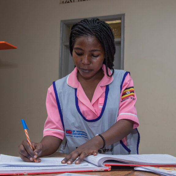 As part of EMPOWER's continuous quality improvement measures, a midwife compiles monthly data from the maternity register on deliveries and postpartum family planning.