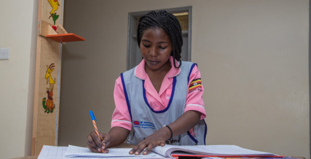 As part of EMPOWER's continuous quality improvement measures, a midwife compiles monthly data from the maternity register on deliveries and postpartum family planning.